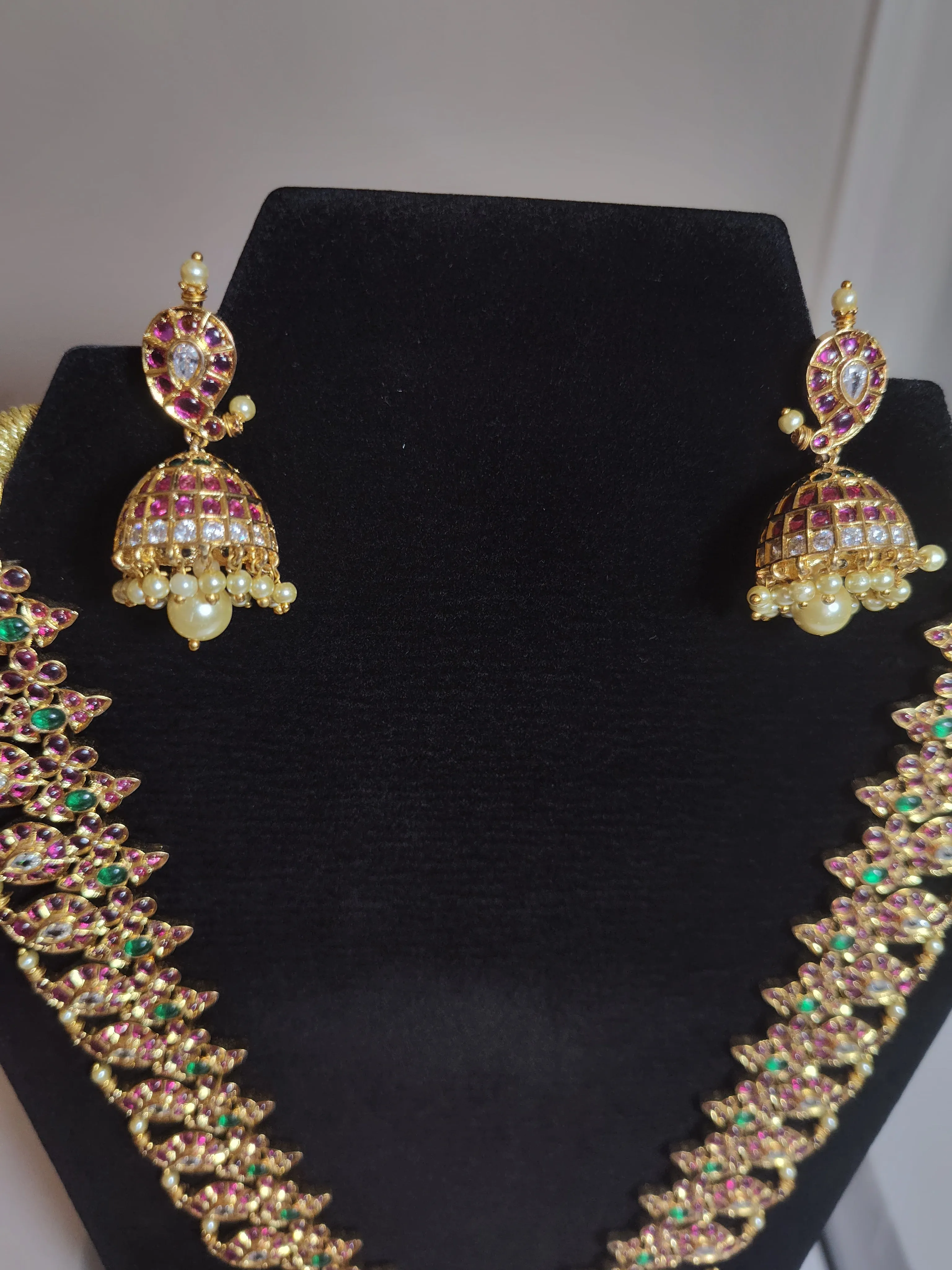 Alluring Long Gold Mango Motif Design Necklace Set With Multicolor Stones