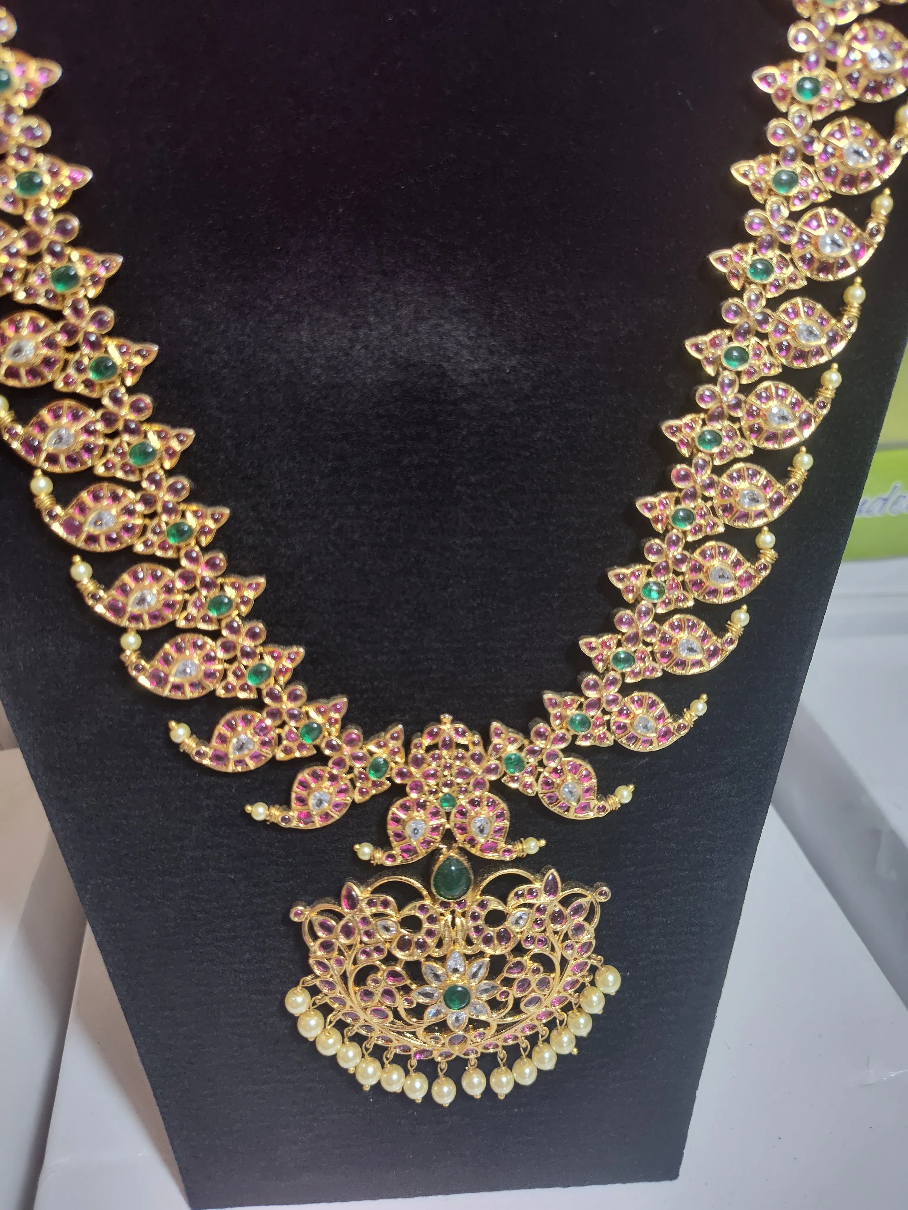 Alluring Long Gold Mango Motif Design Necklace Set With Multicolor Stones